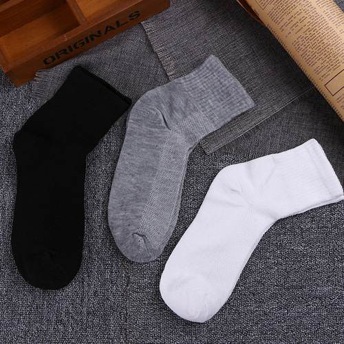 Men's socks wholesale spring and summer mesh thin polyester cotton mid-calf socks business solid color casual socks street stall supply