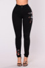European new Black hole embroidered stretch jeans feet pants women