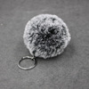 Realistic two-color keychain, bag, transport, pendant, gradient, with snowflakes