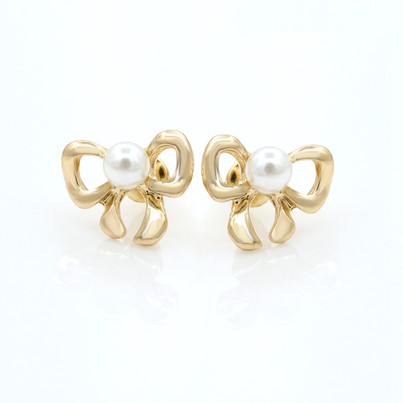 Simple Bow Earrings Gold-plated Silver Inlaid Pearl Earrings 8-shaped Bow Tie Earrings Wholesale display picture 5