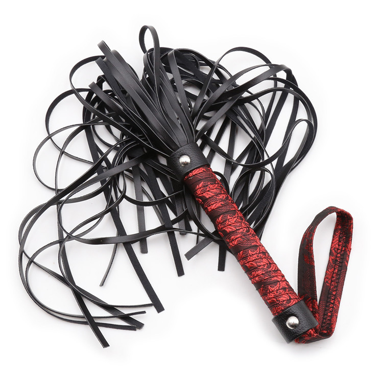 情熱的な赤いハンドル SM ボンデージおもちゃセクシーな革の鞭黒ひげ PU ストライプのアダルト製品緩い鞭