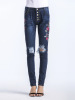 New nets red holes embroidered high waist jeans women trousers