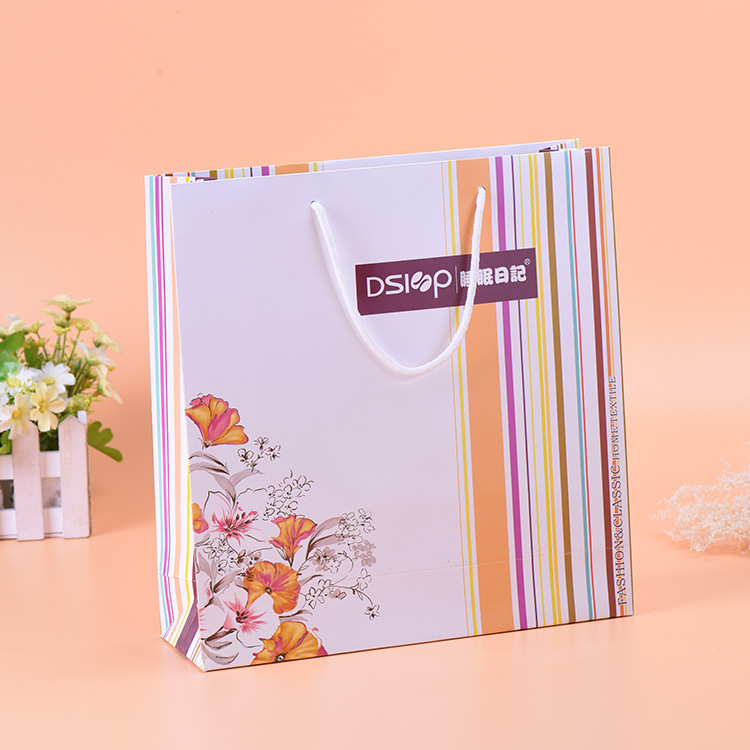 定 制购物手提袋化妆品护肤品面膜包装礼品袋广告白卡纸袋定 做