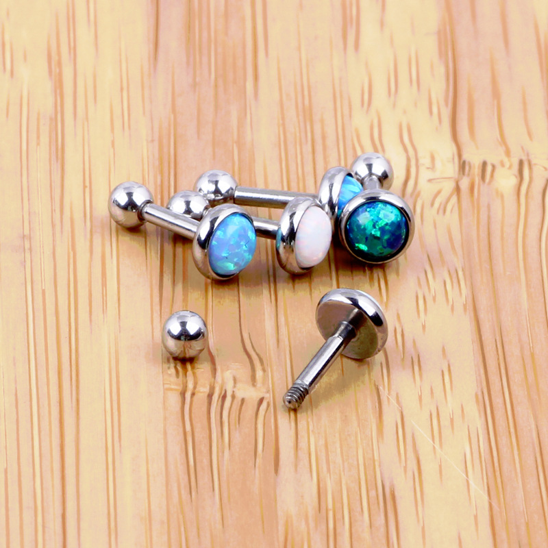 Silver pointed spike labret stud material detail