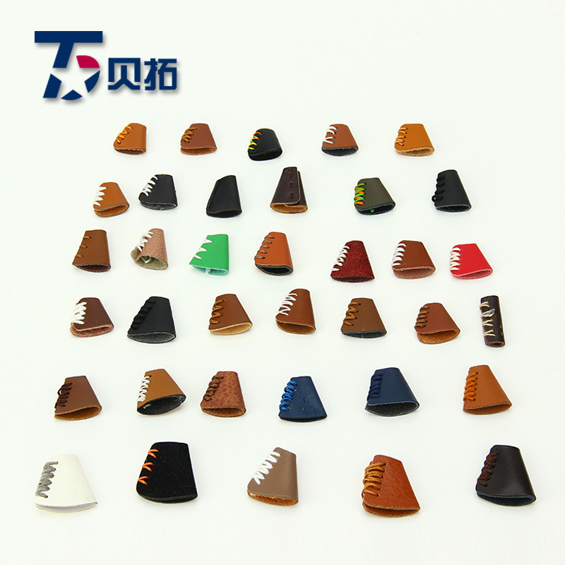 供应手工穿绳皮革吊钟 皮革缝线吊绳 大衣装饰扣绳皮革穿绳扣