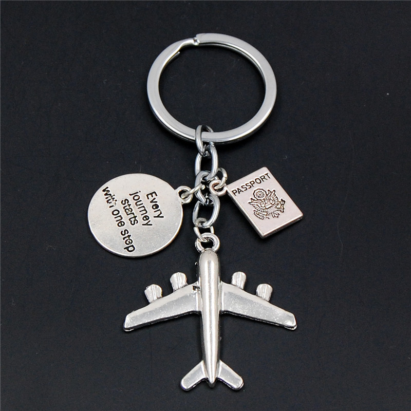 Fashion Round Letter Airplane Alloy Keychain display picture 5
