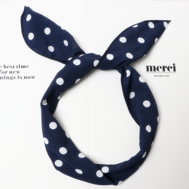 2 navy blue and white polka dots