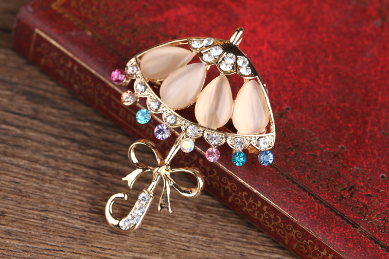 Korean fashion diamant katzenauge persönlichkeit kleine blume regenschirm corsage regenschirm pin kleine frische kleidung brosche_voghion.com