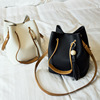 The new winter Dongguk door fringed bag portable Shoulder Messenger female parent bun trend