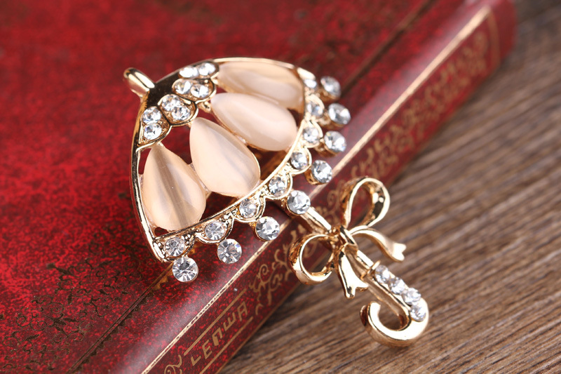 Korean fashion diamant katzenauge persönlichkeit kleine blume regenschirm corsage regenschirm pin kleine frische kleidung brosche_voghion.com