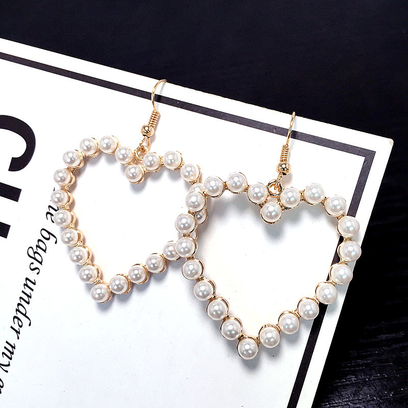 Retro Simple Pearl Heart Earrings display picture 2