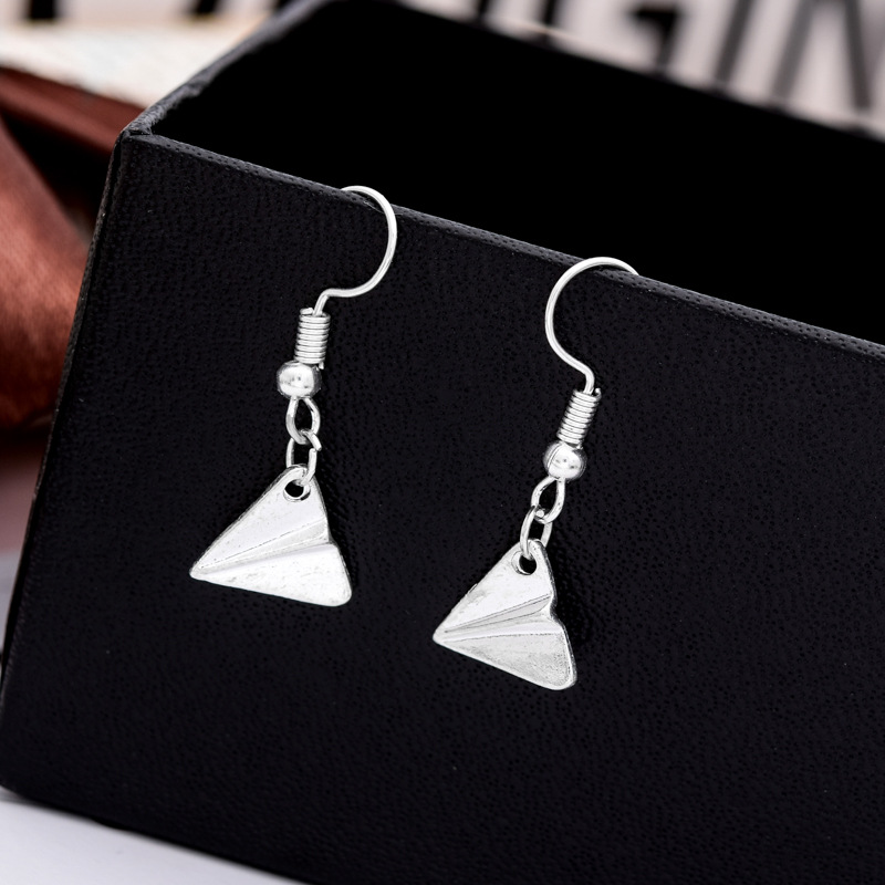 Fashion Simple Small Airplane Head Earrings Alloy Electroplated Paper Airplane Earrings display picture 2
