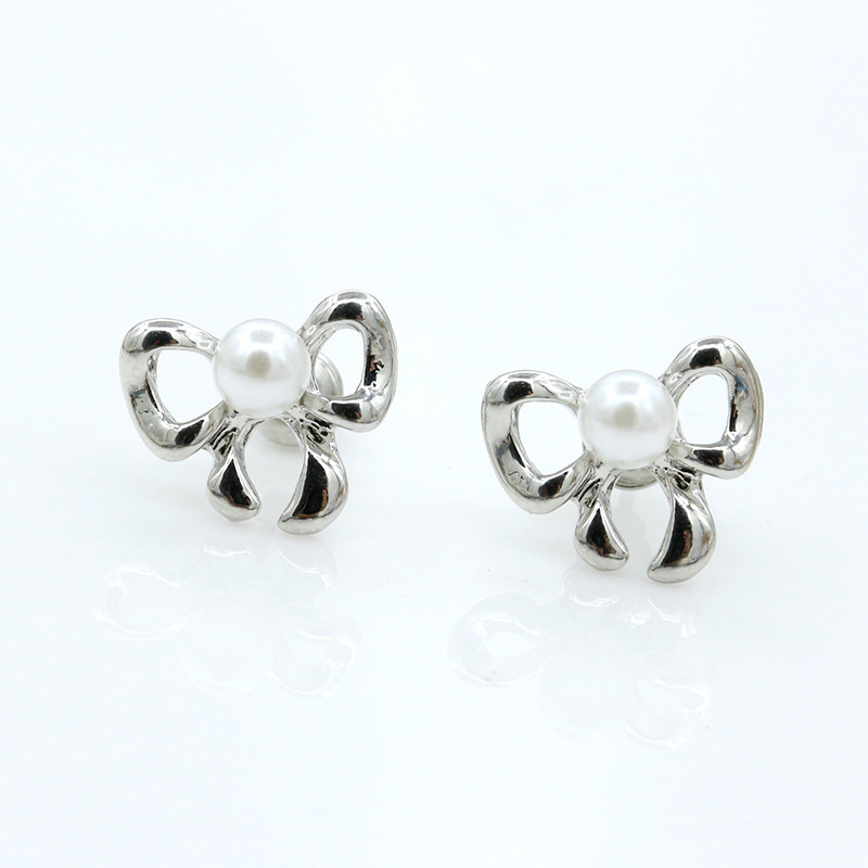 Simple Bow Earrings Gold-plated Silver Inlaid Pearl Earrings 8-shaped Bow Tie Earrings Wholesale display picture 10