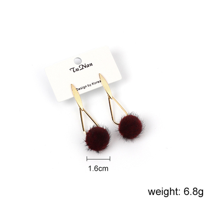 Japanese And Korean Style Plush Candy Pompon Earrings Geometric Metal Wool Ball Ear Studs Women's Winter Ornament display picture 1