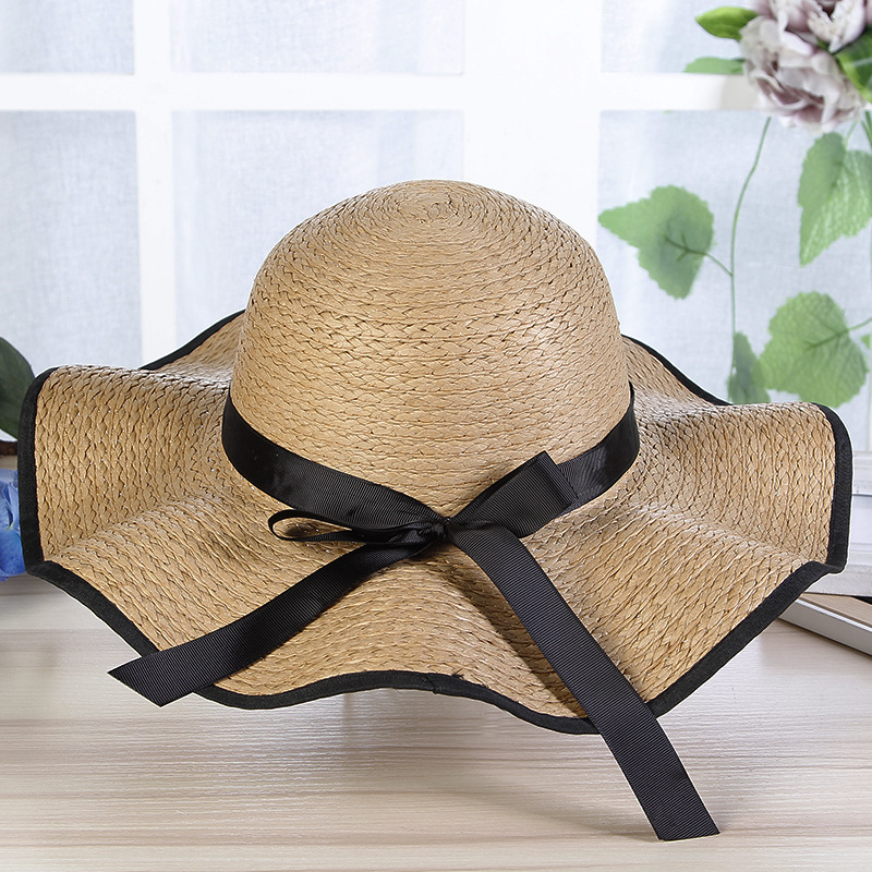 Women's Simple Style Solid Color Wide Eaves Straw Hat display picture 1