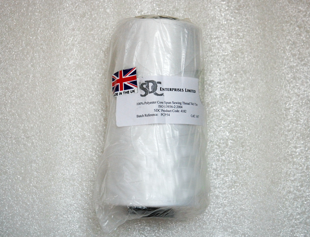 100涤纶包芯纱缝纫线（长丝芯，短纤包覆）线密度（74±5）/tex