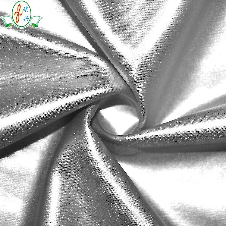 锦氨针织面料 锦纶烫银泳衣布料 有光烫印弹力舞台服装面料