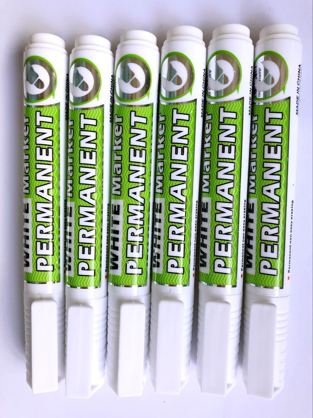 Marcador blanco aceitoso