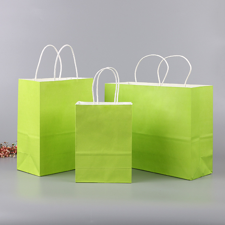 潮博批量销售牛皮纸袋手提袋服装购物纸袋礼品包装袋可定制logo