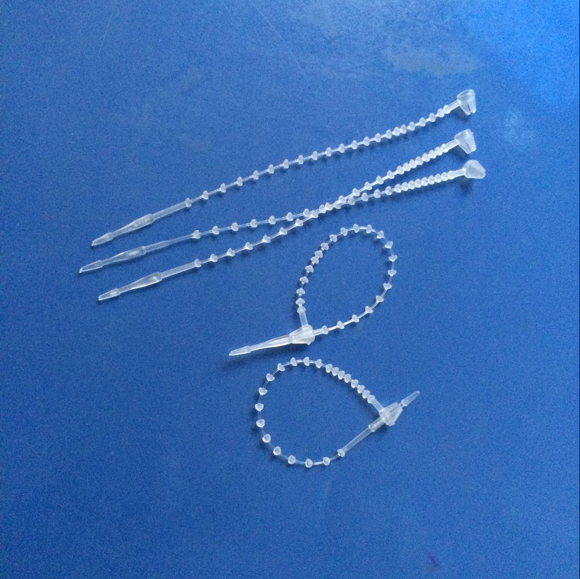 5寸三叉尖头白色子母扣  手穿针 珠带胶针 吊牌线