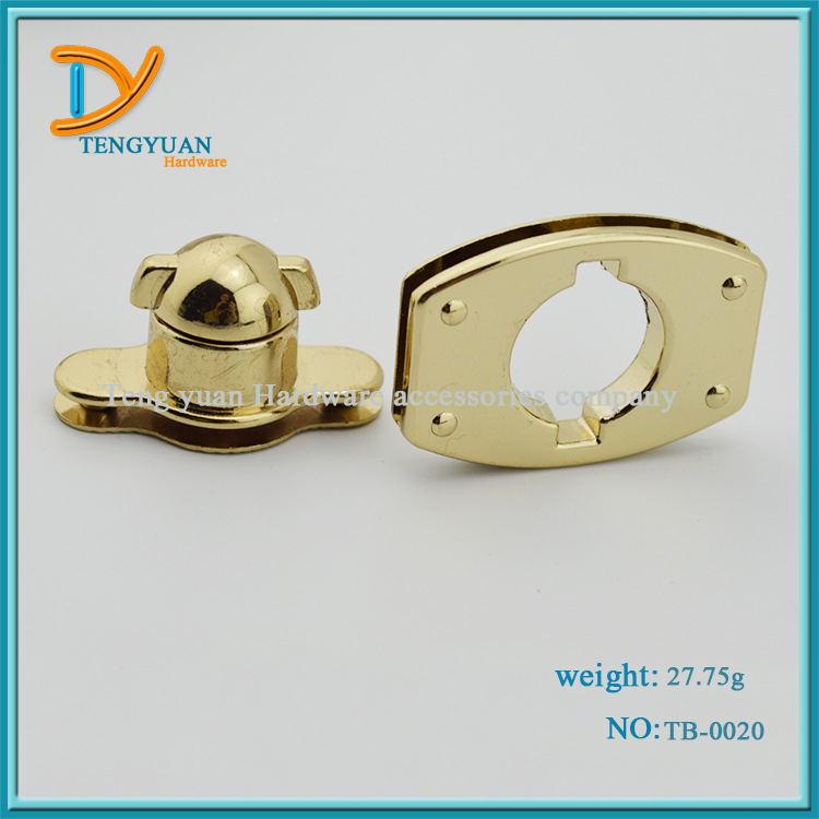 供应手袋箱包五金配件插锁扣 锌合金压铸女包前幅装饰拧锁