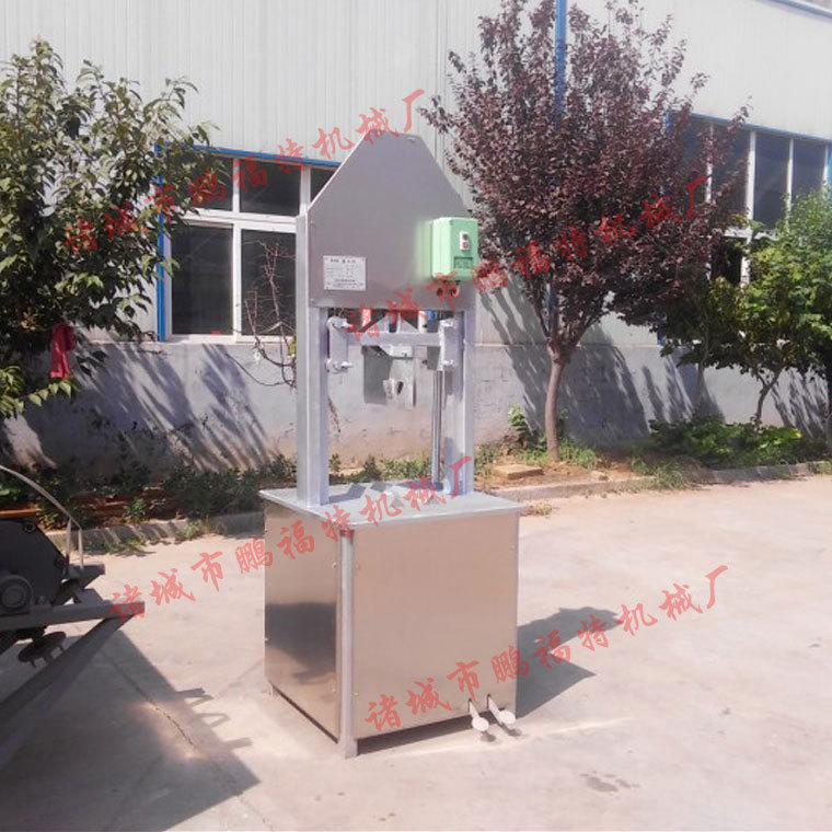 液压猪头劈半机|液压劈猪头机|液压式保留猪脑壳猪头劈半机1