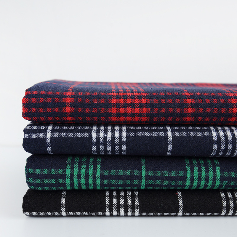 厂家现货 21S涤棉格子布 男女童装服装衬衣面料 磨毛拉绒色织布