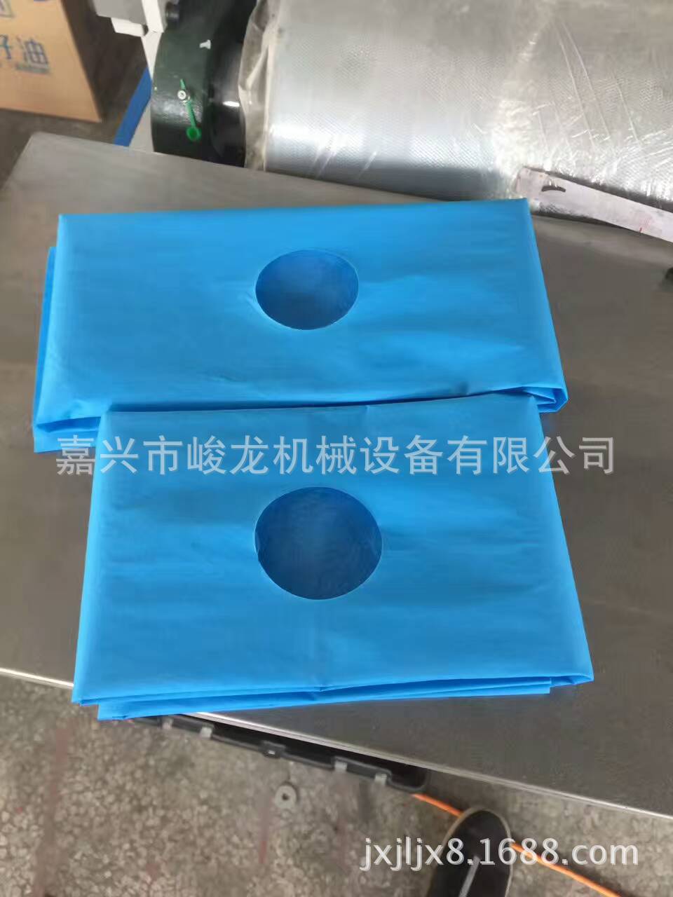 1全自动无纺布床单机 太阳孔床单折叠机 一次性垫单床单浴巾设备