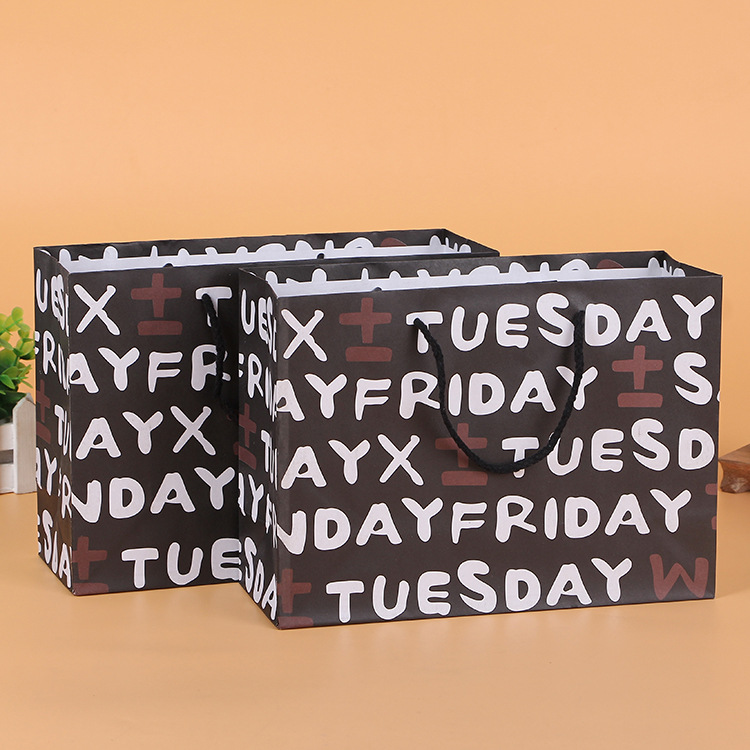 厂家直销创意环保字母礼品手提袋 服装购物广告手提牛皮纸袋