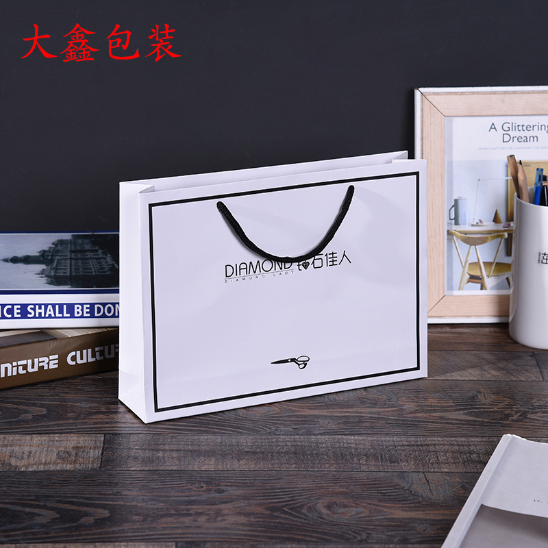 白色包装手提纸袋 礼物服装包装袋 礼品纸袋厂家LOGO加印批发
