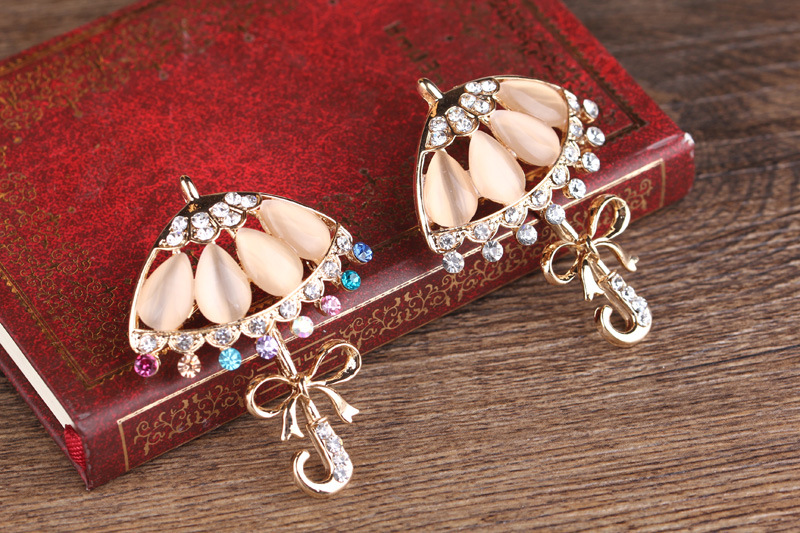 Korean fashion diamant katzenauge persönlichkeit kleine blume regenschirm corsage regenschirm pin kleine frische kleidung brosche_voghion.com
