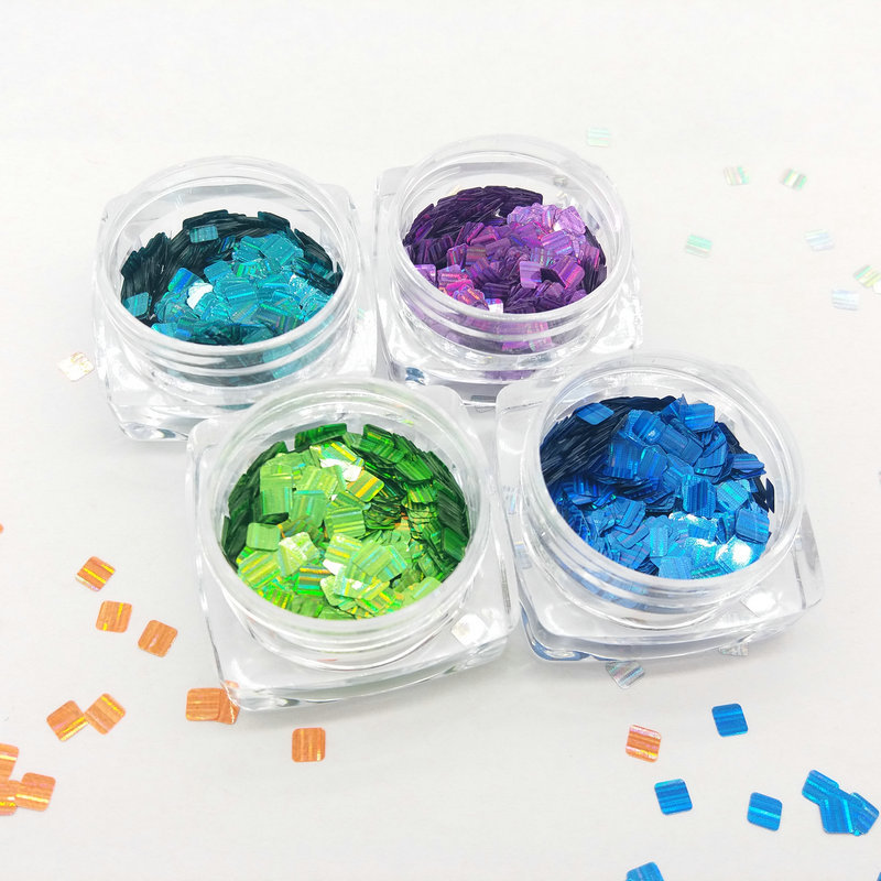 Rectangular rounded corner holographic glitter nail supplies wholesale, holographic glitter nail supplies, kilogram packs available from manufacturer.