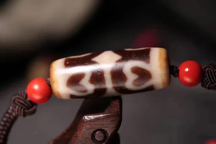 虎牙莲花心天珠寓意,戴天珠有什么讲究,天珠的寓意及效_大山谷图库