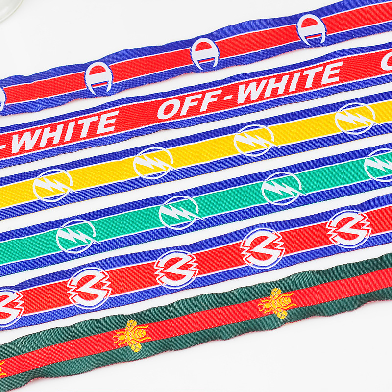厂家直销2.5cm薄款OFF商标织唛带 红白蓝提花带大量现货批发
