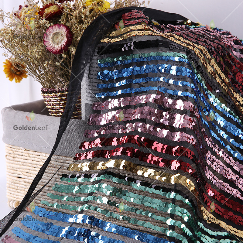 厂家热销 时尚秋季新款网纱条子亮片绣面料 时装礼服珠片绣花布