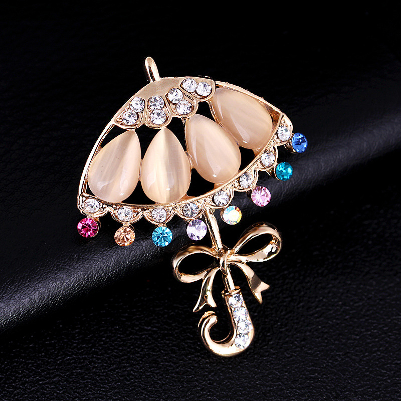 Korean fashion diamant katzenauge persönlichkeit kleine blume regenschirm corsage regenschirm pin kleine frische kleidung brosche_voghion.com