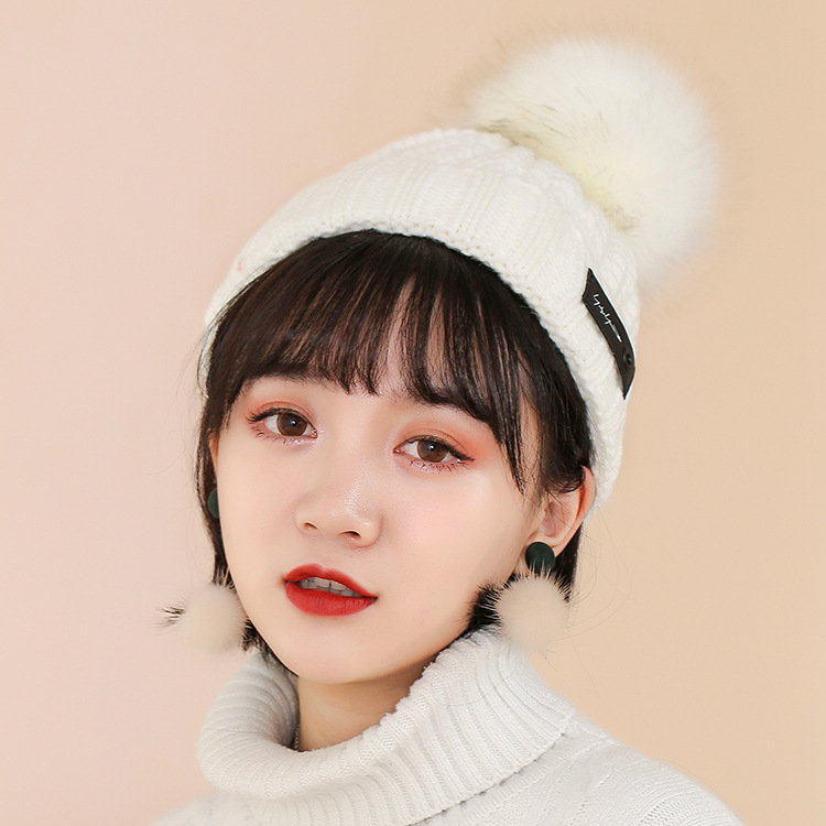 Mùa thu và mùa đông mới mũ Hàn Quốc chữ cái da tiêu chuẩn đan mũ ấm phụ nữ tai bảo vệ nắp len giải trí nhà mũ triều