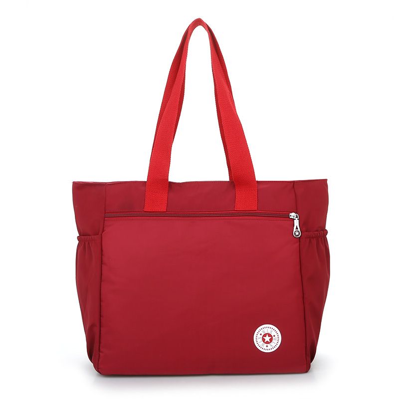 Transfronterizo 2021 primavera e invierno nuevo bolso de hombro de mujer bolso de nylon de gran capacidad bolso de momia de color sólido multifuncional