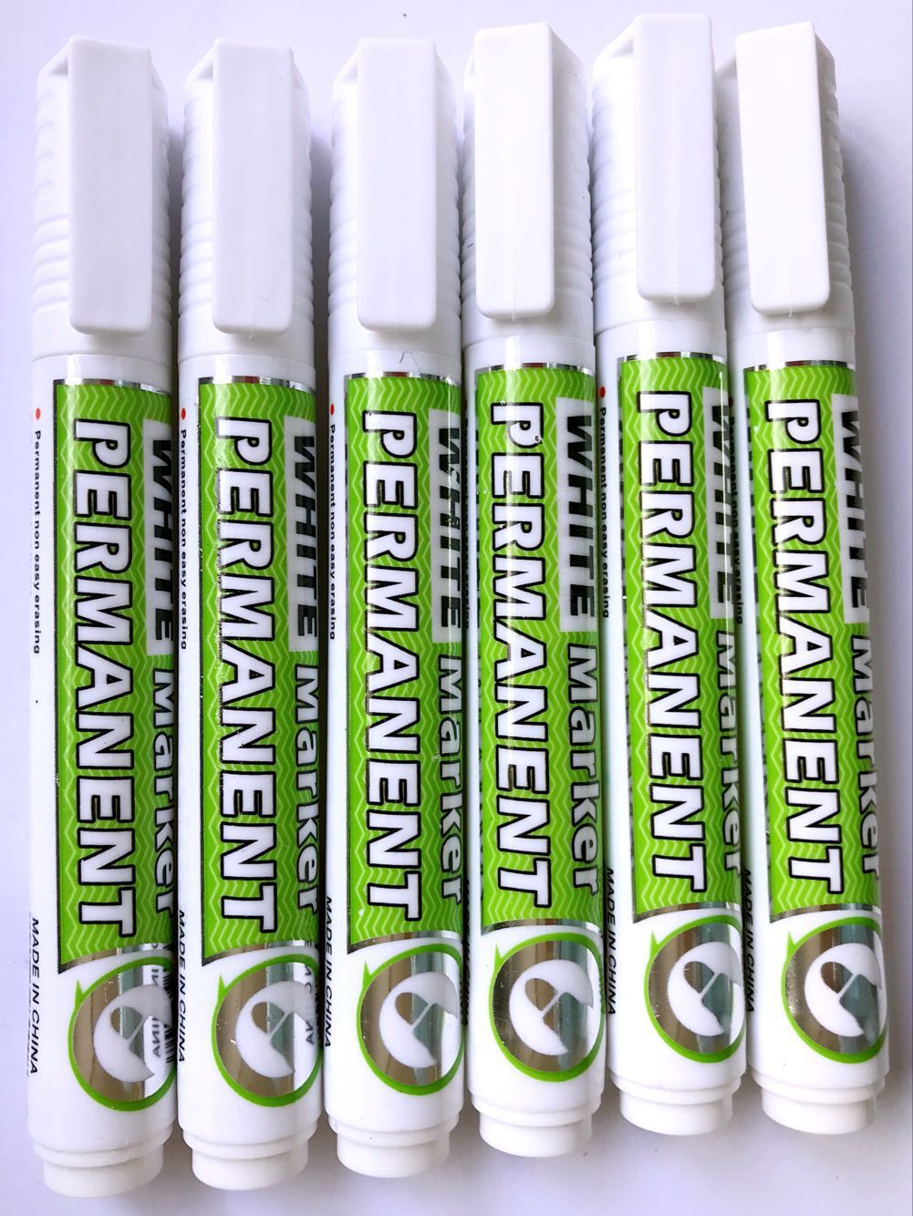 Marcador blanco aceitoso