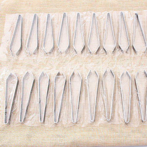 Hotel supplies stainless steel fish bone clip household fish bone clip kitchen gadgets pig hair clip household duck feather plucker