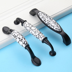 Supply black and white ceramic handles, American minimalist cabinet handles, European wardrobe door handles round single hole drawers