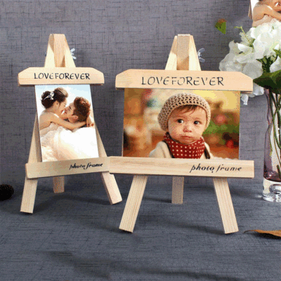 Manufactor wholesale New products originality Swing sets solid wood Small easel Wood Frame Wedding dress Children's paintings pinpoint LOGO