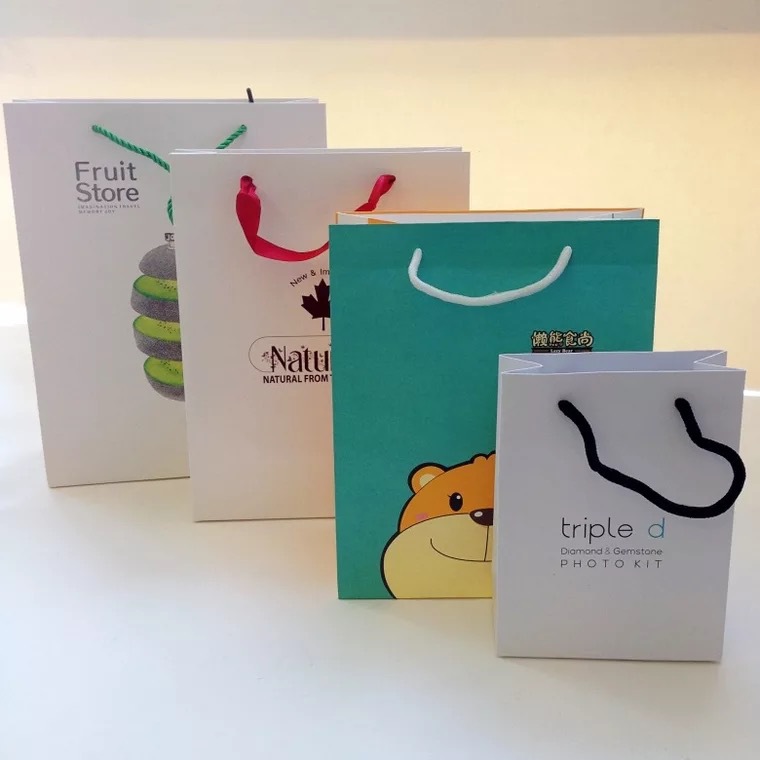 铜版纸袋手提袋印刷服装袋包装袋通用礼品纸袋广告袋纸袋