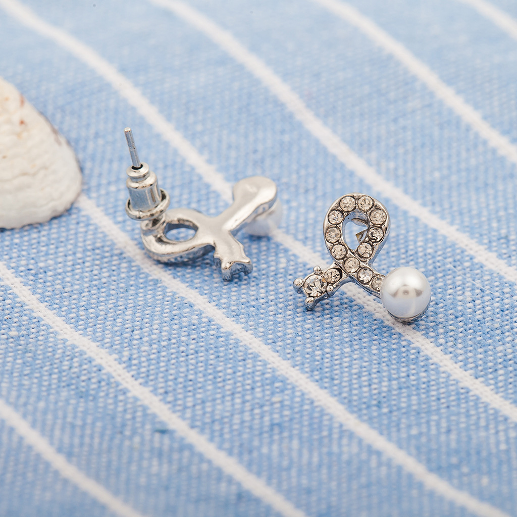 Außenhandel Heißer Verkauf Bogen Ohrringe Versilbert Eingelegte Perlen Kristall Ohrringe Ohrringe Einfache Liebe Herzförmige Ohrringe Großhandel display picture 7