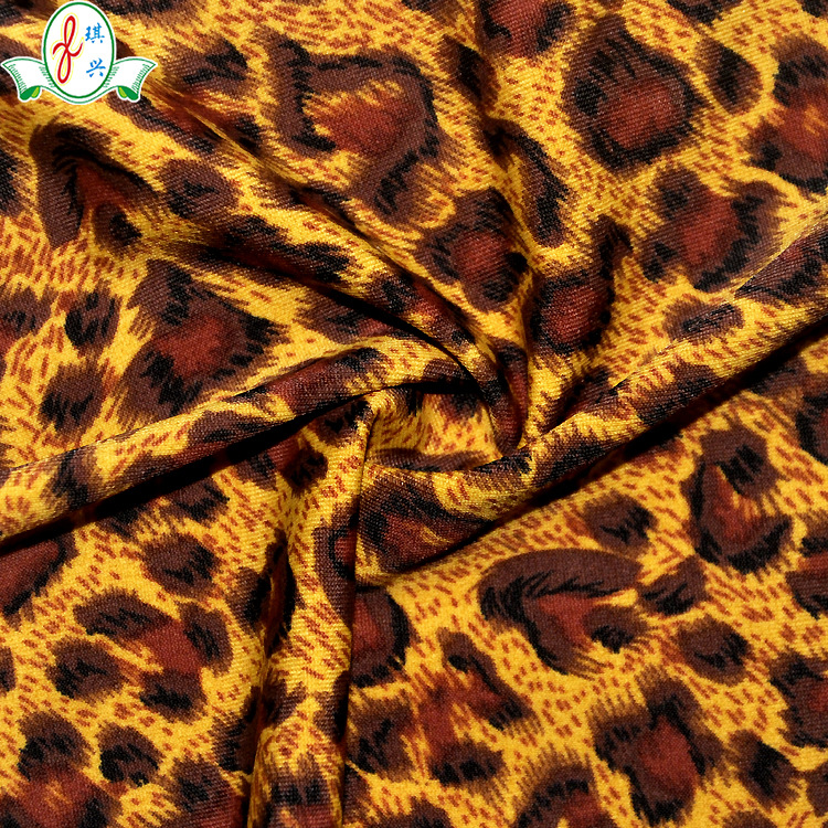 供应针织面料米高布滑手 哑光锦氨纤维泳衣面料 豹纹印花泳衣布