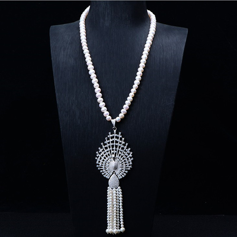 2019款臻品潮流爆款珍珠项链  流苏控 母贝珍珠长款孔雀毛衣链