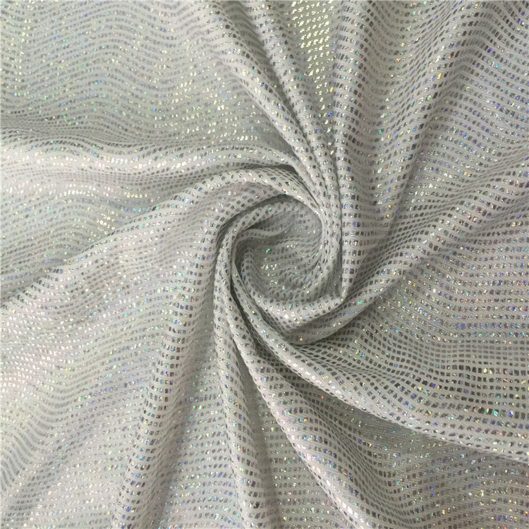 白色牛奶丝涤氨顺滑四面弹水波纹波浪银色镭射烫金反光面料女装