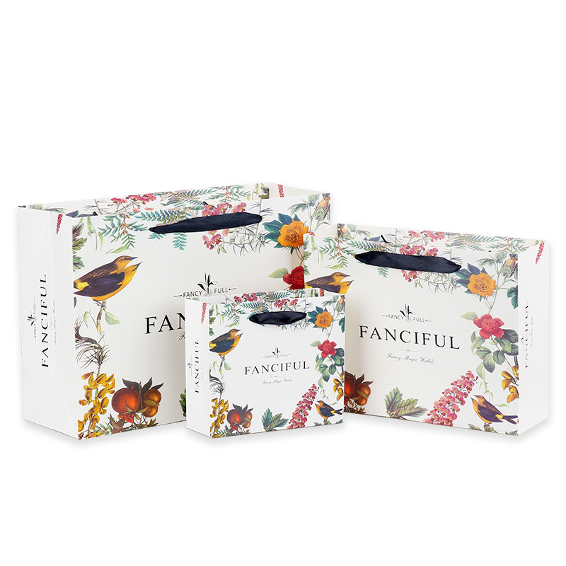 Ropa bolsa de regalo bolso bolsa de papel creativo retro exquisito bolso de compras impreso logo bolsa de regalo