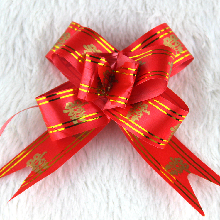 批发喜庆用品蝴蝶结手拉花 礼品包装抽花中号 车把彩带婚车手扎花|ms