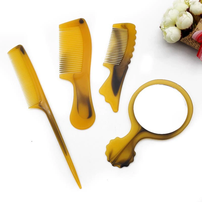 A2244 316 four -piece combing combed horn combed plastic combed combed Yiyu 2 yuan store department store wholesale